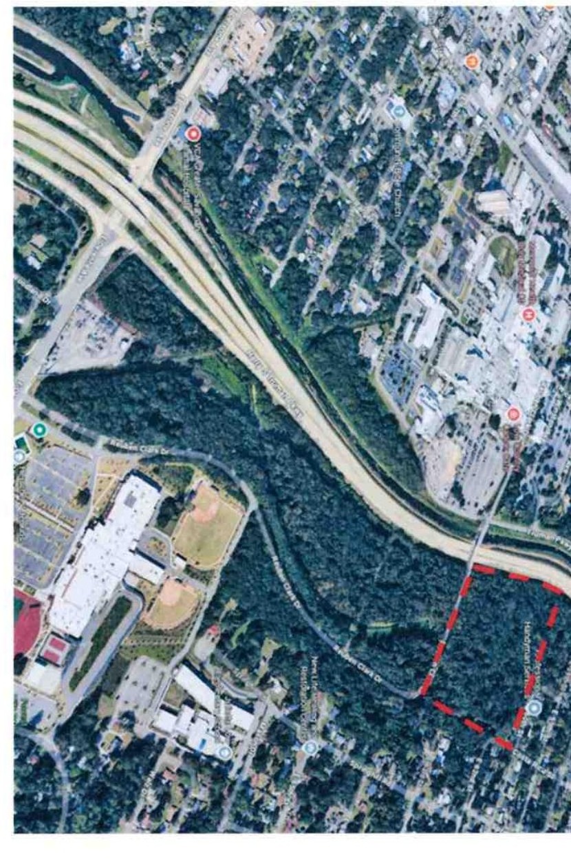 Official aerial context map showing the 1800 East 63rd Street project site outlined beside Truman Parkway and Reuben Clark Drive.